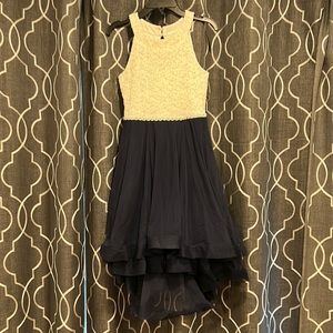 Pretty, sparkly dress. Beading detail in front and sparkles in the lace bodice.